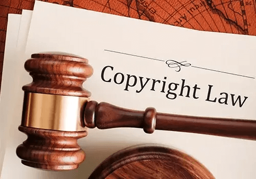 A gavel on a copyright law sheet