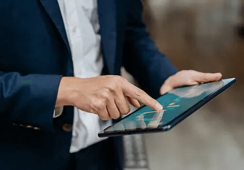 A person working on a tablet