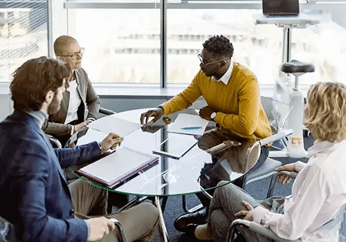 People sitting on a conference table